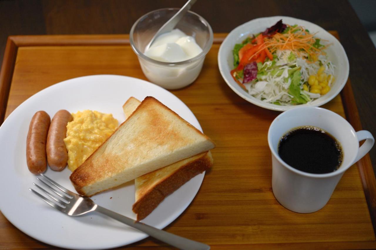 Guesthouse Iwase Toyama Station Extérieur photo